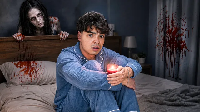 Ghostly woman rising behind a frightened creator in bed